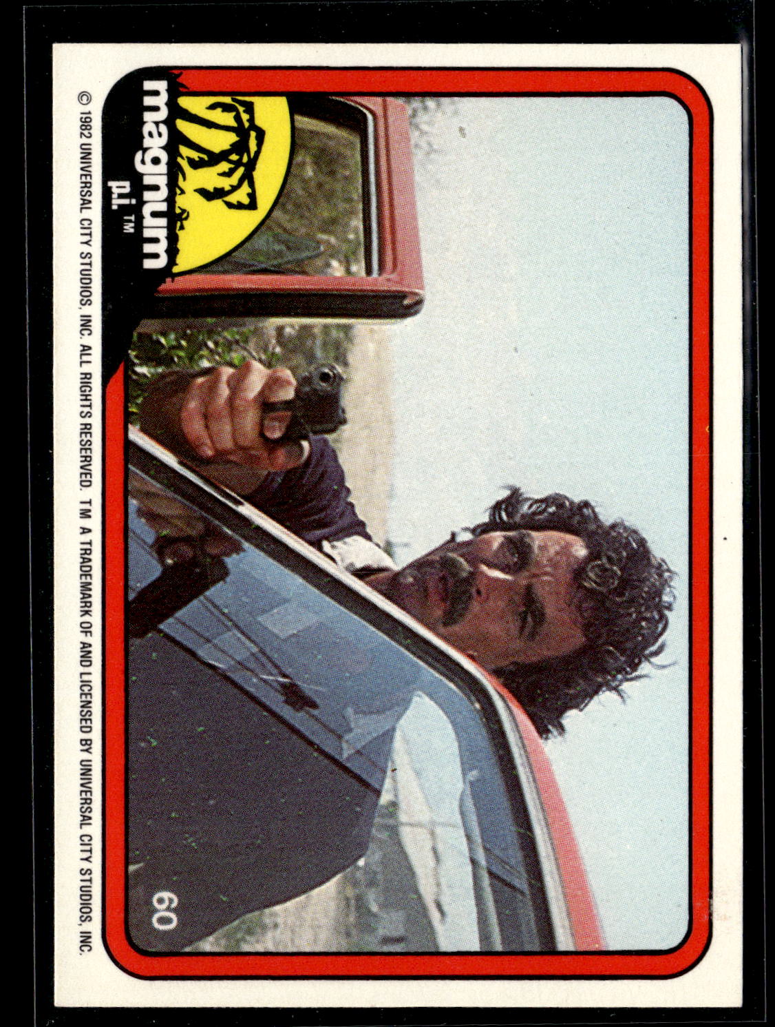 1983 Donruss Magnum P.I. #60 (aiming gun from car door)